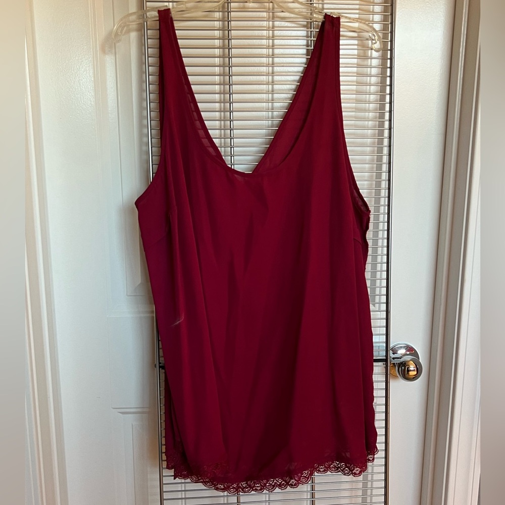 Deep red loose fitting, sheer tank with lace details